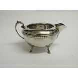 Victorian silver cream jug, Birmingham 1854. Weight 5.08ozt. Estimate £45-55.