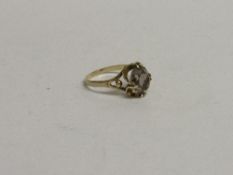 9ct gold hallmarked citrine ring, size K, weight 2.4gms. Estimate £35-55.