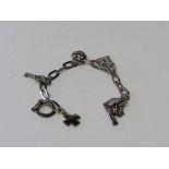 Silver T-bar charm bracelet & charms. Estimate £15-25.