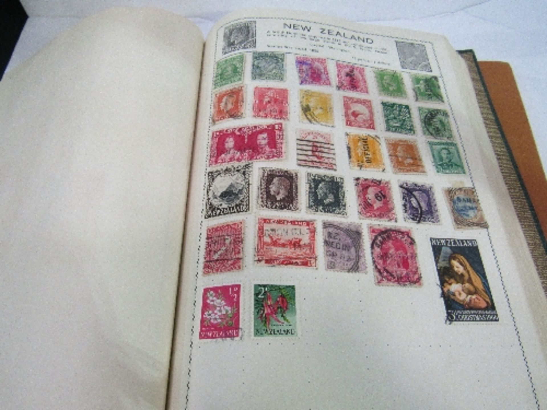 2 stamp albums with various GB & World stamps. Estimate £10-20.