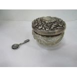 Hallmarked silver napkin holder & a hallmarked silver lidded repousse decorated glass pot.