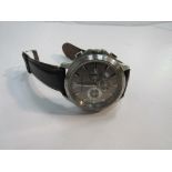 Emporio Armani wristwatch with leather strap. Estimate £25-35.