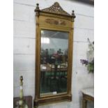 Large gilt framed wall mirror with reeded pillar sides & finials & open work crest, 74cms x