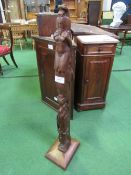 Small totem pole, carved, height - 119cms. Estimate £20-30.