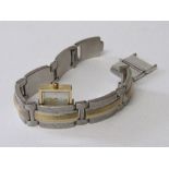 Fossil lady's slide-out watch with spare links. Estimate £10-20.