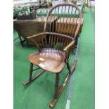 Windsor stick back rocking chair. Estimate £400-420.