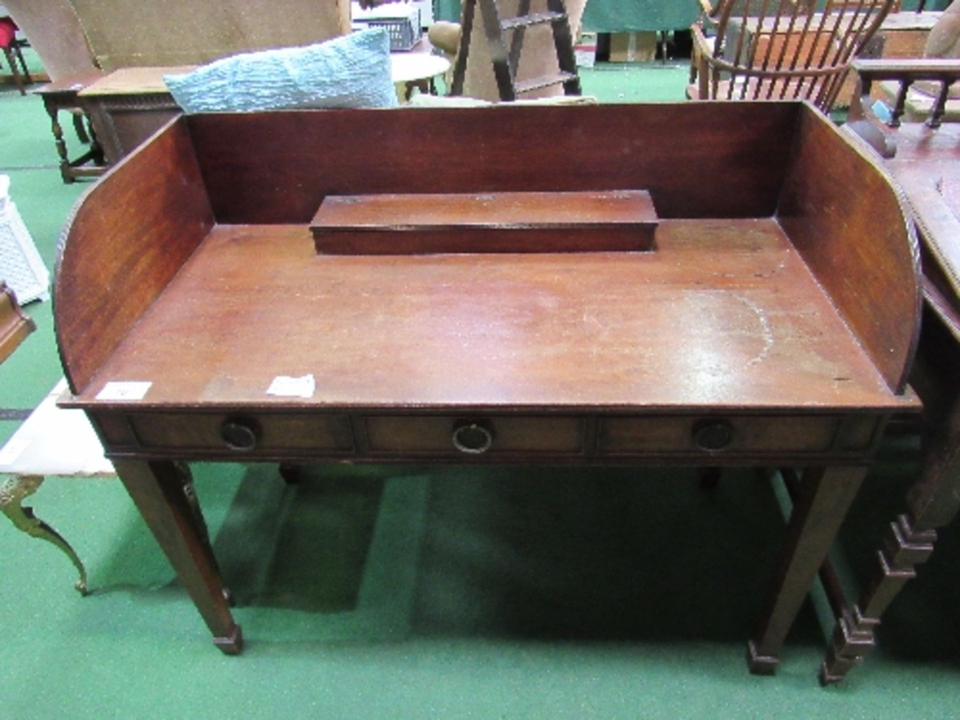 Mahogany desk with centre frieze drawer, side & rear panel, inkwell holder on tapered legs, 108cms x