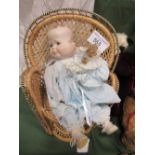Reproduction 3-faced doll. Estimate £40-60.