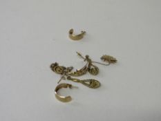 3 pairs of gold earrings. Estimate £15-25.