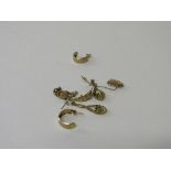 3 pairs of gold earrings. Estimate £15-25.