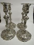 A set of 4 solid silver Georgian candlesticks by William Brown, London 1827, highly repousse