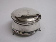 Circular lined silver lidded jewellery pot, silver marks are worn away. Weight 6.37ozt. Estimate £