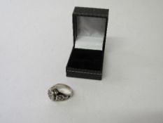 Sterling silver & black enamel poison ring. Estimate £24-30.