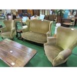 2 seater wing back sofa, 130cms x 70cms x 90cms & 2 matching armchairs. Estimate £30-50.