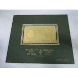 Limited edition gold £5 Bank of Ireland note by J Howard Howe, RBA FRSA. Estimate £10-20.