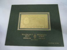 Limited edition gold £5 Bank of Ireland note by J Howard Howe, RBA FRSA. Estimate £10-20.