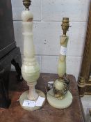 2 onyx lamp bases. Estimate £20-30.