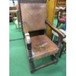 Heavy oak open armchair with leather back & seat, a/f. Estimate £50-80.