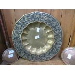 Large circular brass tray with Middle Eastern design, approx. 77cms diameter. Estimate £30-50.