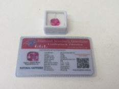 Cushion cut natural pink sapphire. 10.8ct, with certificate. Estimate £50-70.