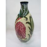Moorcroft flower bottle vase, 2006. Height 32cms. Estimate £200-300.