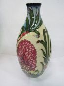 Moorcroft flower bottle vase, 2006. Height 32cms. Estimate £200-300.