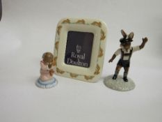 Royal Doulton figurines: Tryolean Dancer Bunnykins; Goodnight Bunnykins & a Bunnykins photo frame.