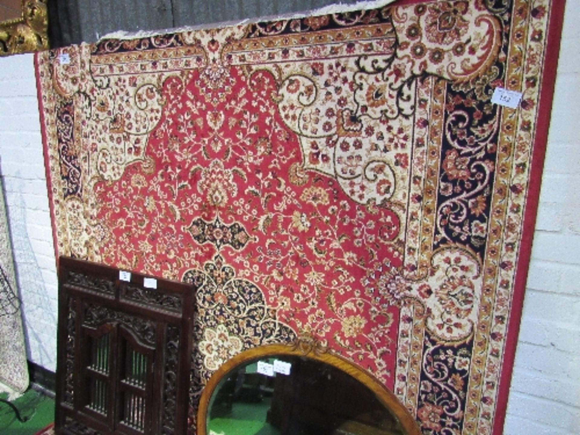 Red ground Keshan carpet, 2.8 x 2.0. Estimate £80-100.