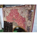 Red ground Keshan carpet, 2.8 x 2.0. Estimate £80-100.