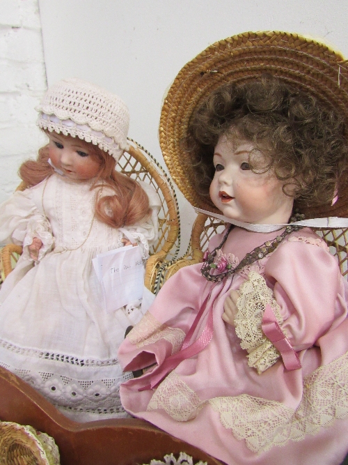 A Neubach German doll (needs re-stringing) & another doll, letter W on neck, both on small wicker - Image 2 of 3