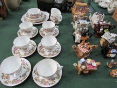 Part Royal Sutherland tea service & 13 various novelty teapots. Estimate £30-50.