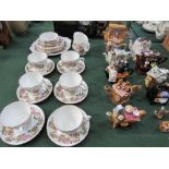 Part Royal Sutherland tea service & 13 various novelty teapots. Estimate £30-50.