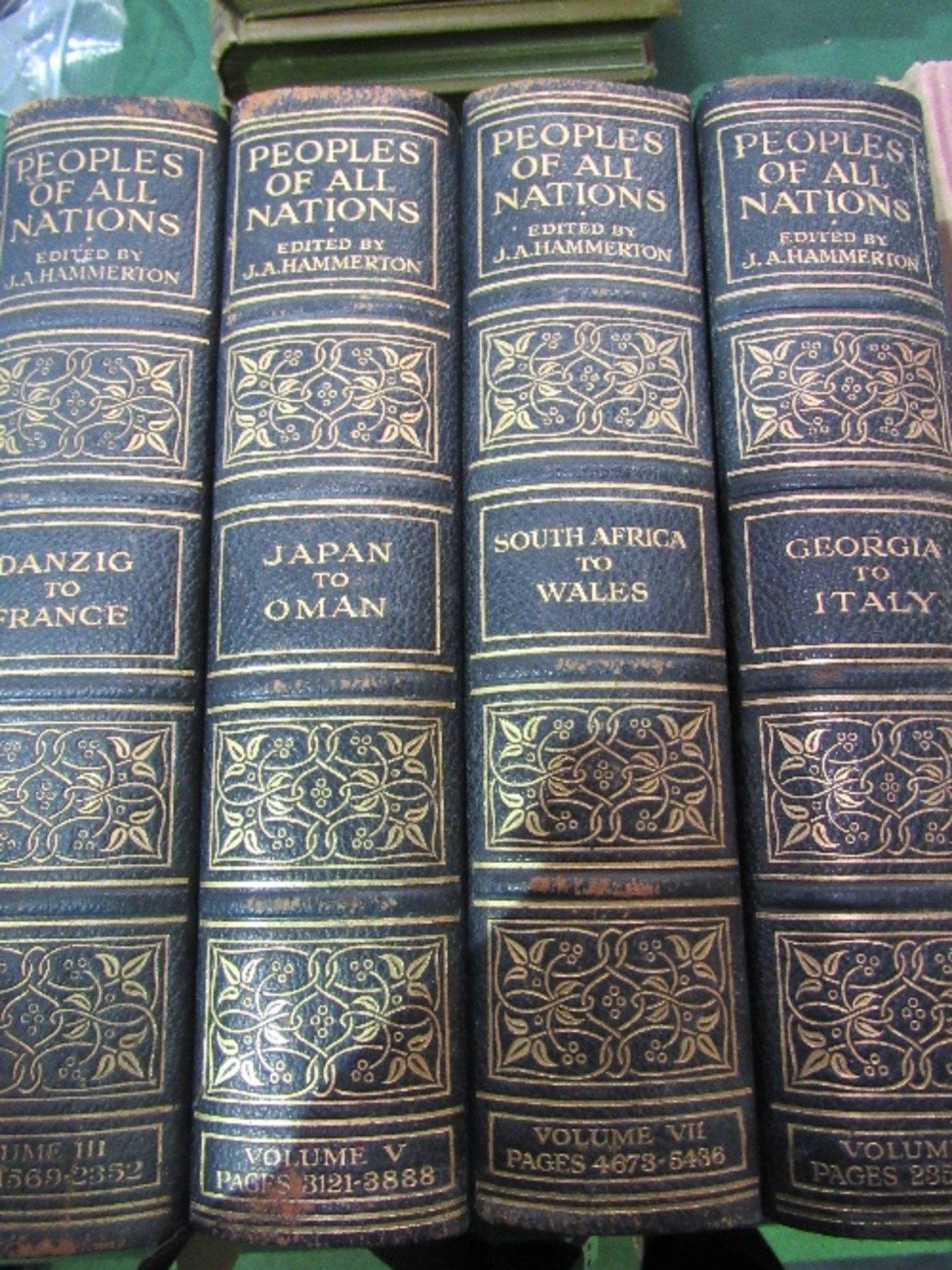 7 volumes of 'Peoples of All Nations' c/w colour plates & maps, circa 1920's. Estimate £10-20.