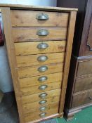 Antique pine Wellington-style tall chest of drawers, 55cms x 56cms x 125cms. Estimate £50-60.