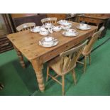 Pine kitchen table on turned legs, 153cms x 91cms x 77cms, together with 4 Windsor chairs