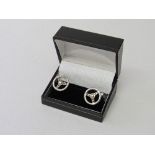 Murray Walker sterling silver cufflinks. Estimate £22-30.