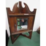 Small dark oak corner wall cupboard with mirrored door. Estimate £20-30.