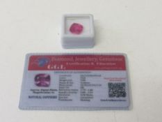 Cushion cut natural pink sapphire, 9.80ct, with certificate. Estimate £50-70.