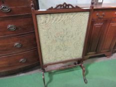 Mahogany framed tapestry fire screen, 58cms width x 98cms height. Estimate £20-30.