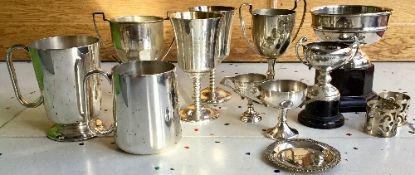 Collection of silver plate trophies. Estimate £10-20.