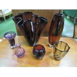 6 pieces of dark red coloured glass ware. Estimate £20-30.