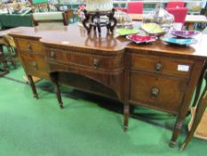 Mahogany shaped front sideboard on reeded column supports, 165cms x 64cms x 93cms. Estimate £40-60.