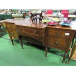 Mahogany shaped front sideboard on reeded column supports, 165cms x 64cms x 93cms. Estimate £40-60.