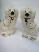 A pair of Beswick Staffordshire dog figurines. Estimate £20-30.