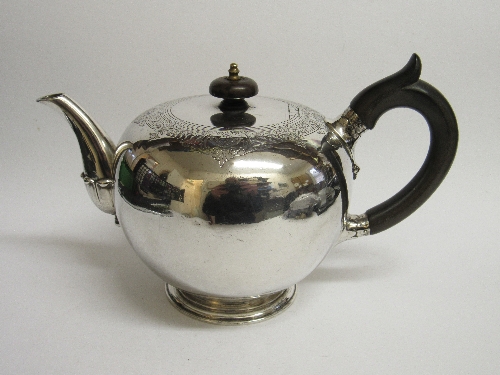 Silver teapot by Garrards of London with a wooden handle & knob, engraved with crest of rampant lion - Image 2 of 3