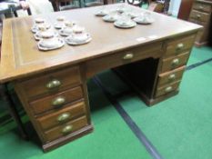 Large Partners' oak desk with leather skiver, drawers to one side & cupboards to the other end,