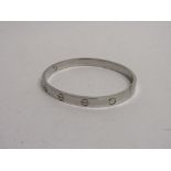 18ct white gold Cartier bracelet, IP6688. Estimate £2,000 - 2,500.