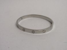 18ct white gold Cartier bracelet, IP6688. Estimate £2,000 - 2,500.