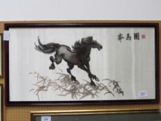 Framed & glazed oriental silk art picture of a horse. Estimate £10-20.