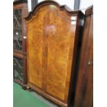 Burr walnut double door wardrobe with a break-arch top, 116cms x 48cms x 200cms. Estimate £30-40.
